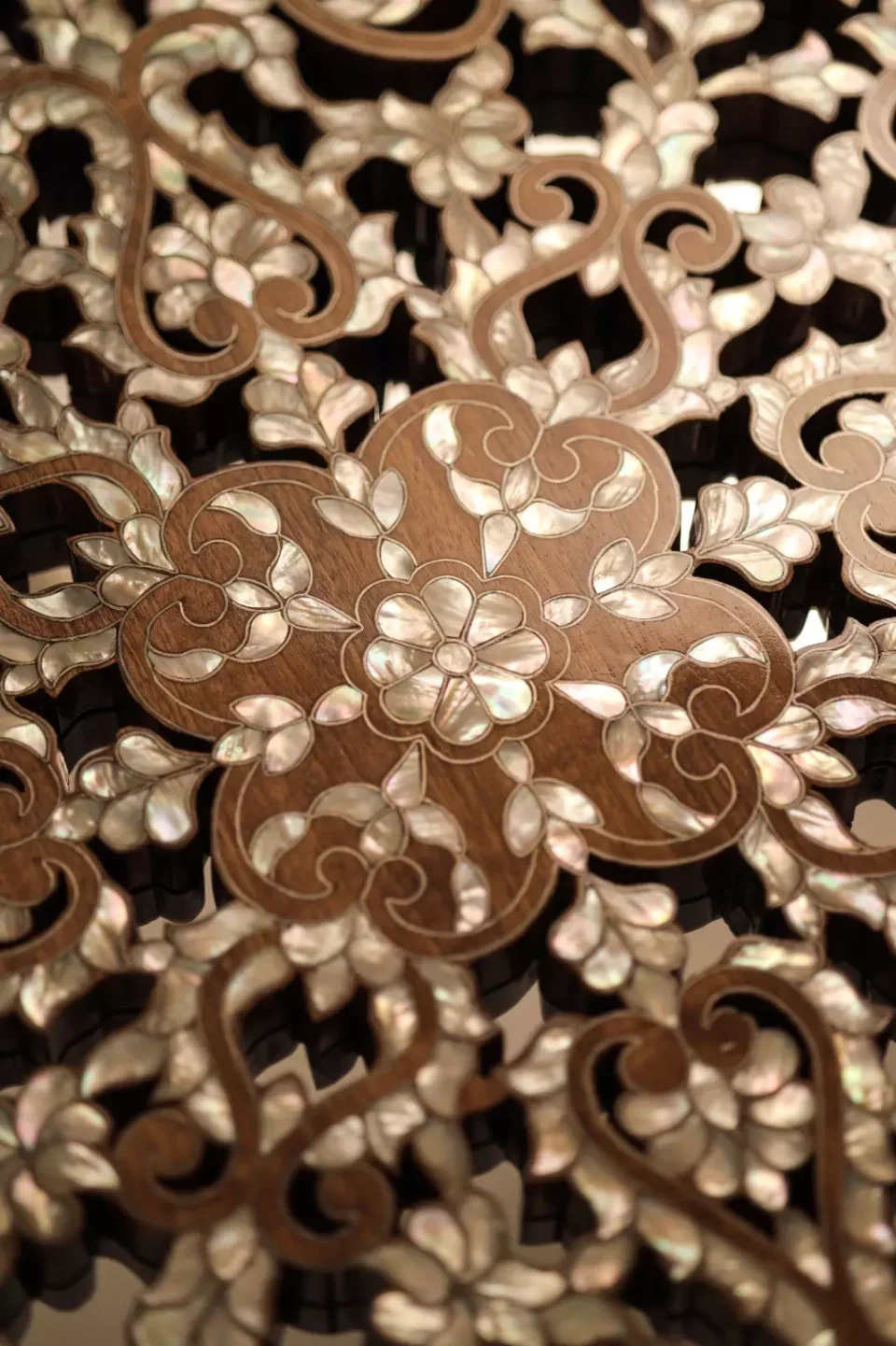 Round table carved and inlaid with mother-of-pearl