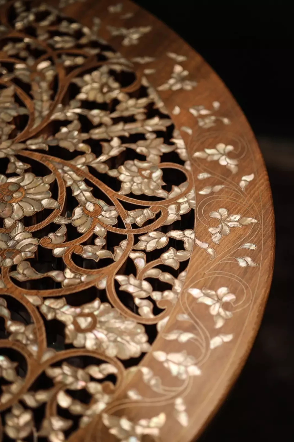 Round table carved and inlaid with mother-of-pearl