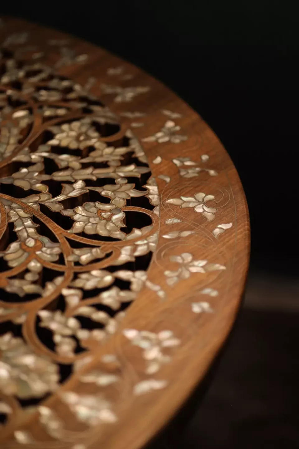 Round table carved and inlaid with mother-of-pearl