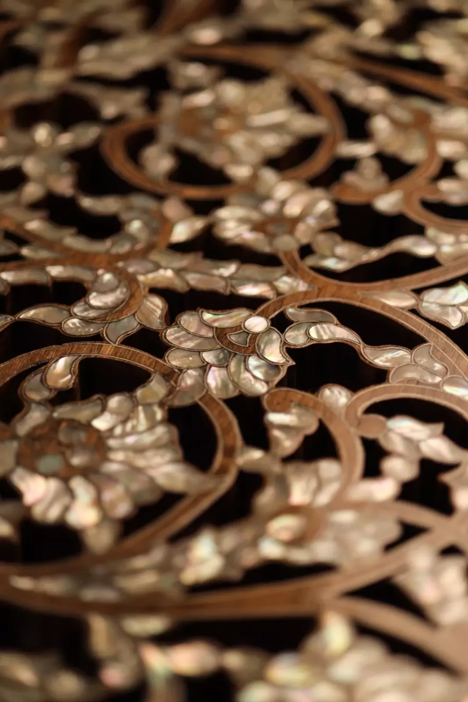 Round table carved and inlaid with mother-of-pearl