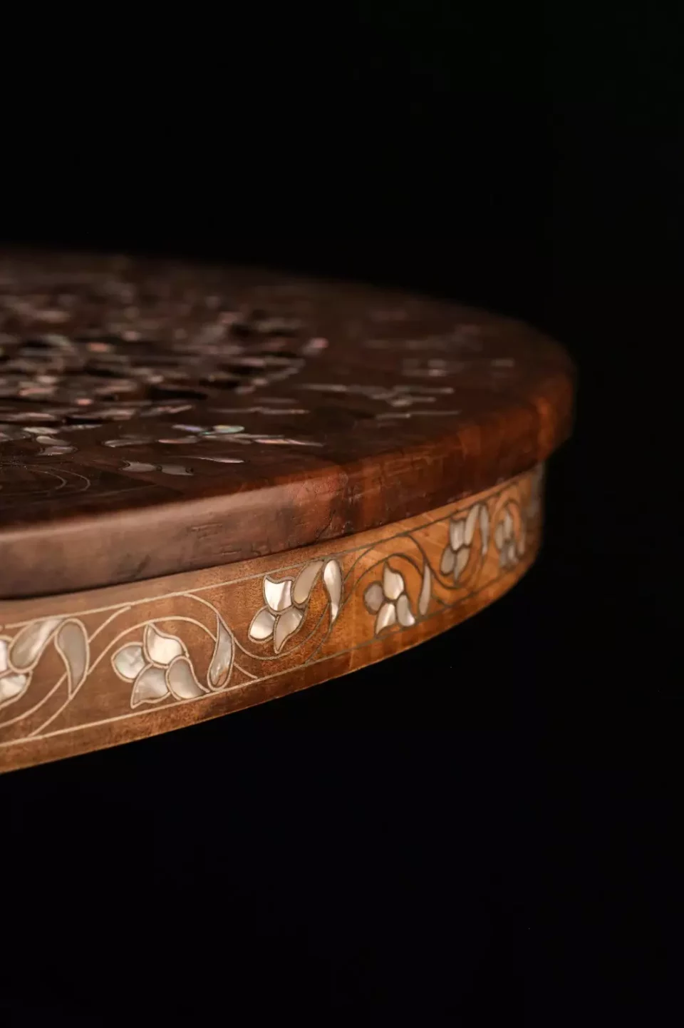 Round table carved and inlaid with mother-of-pearl