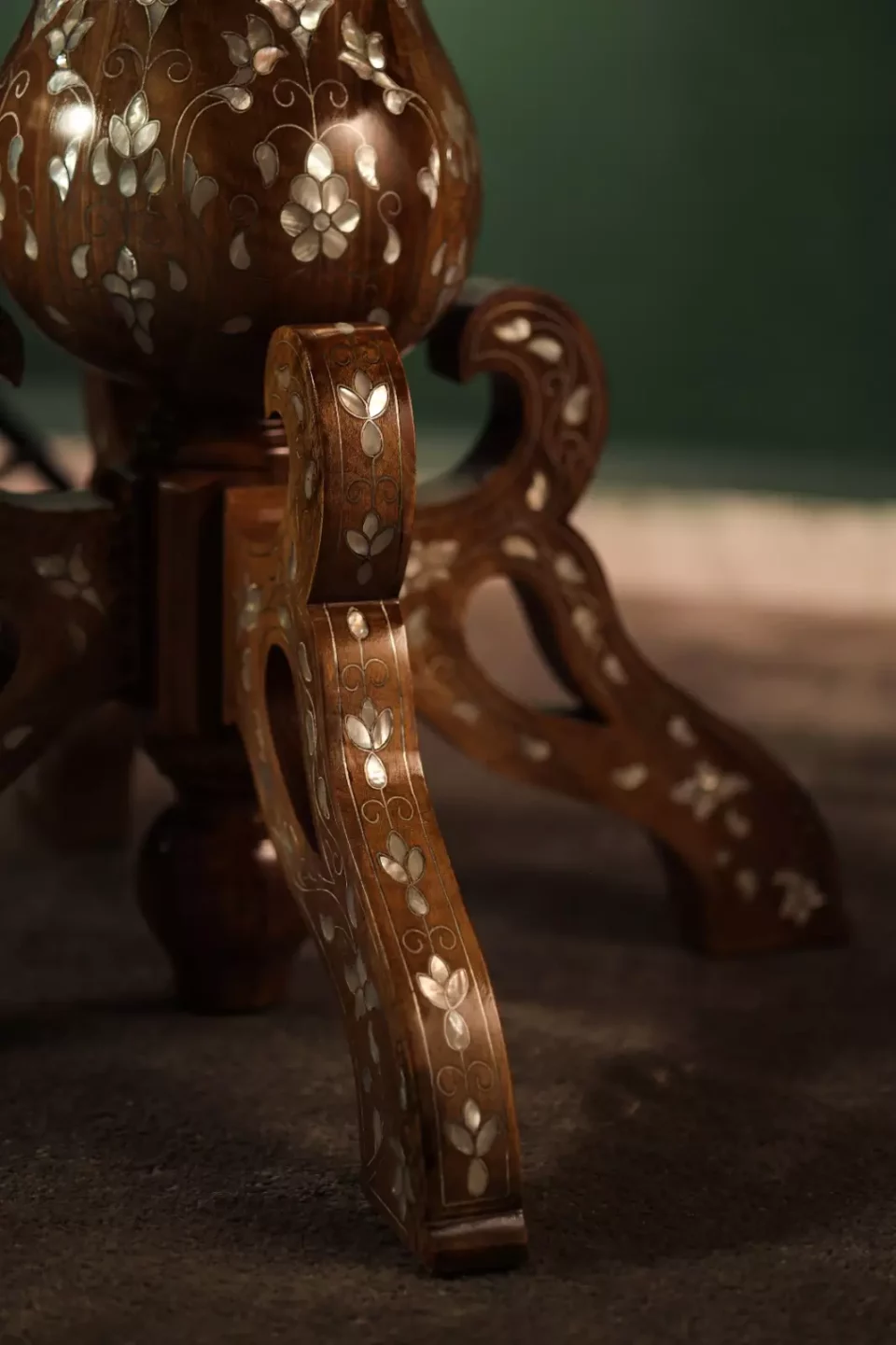 Round table carved and inlaid with mother-of-pearl