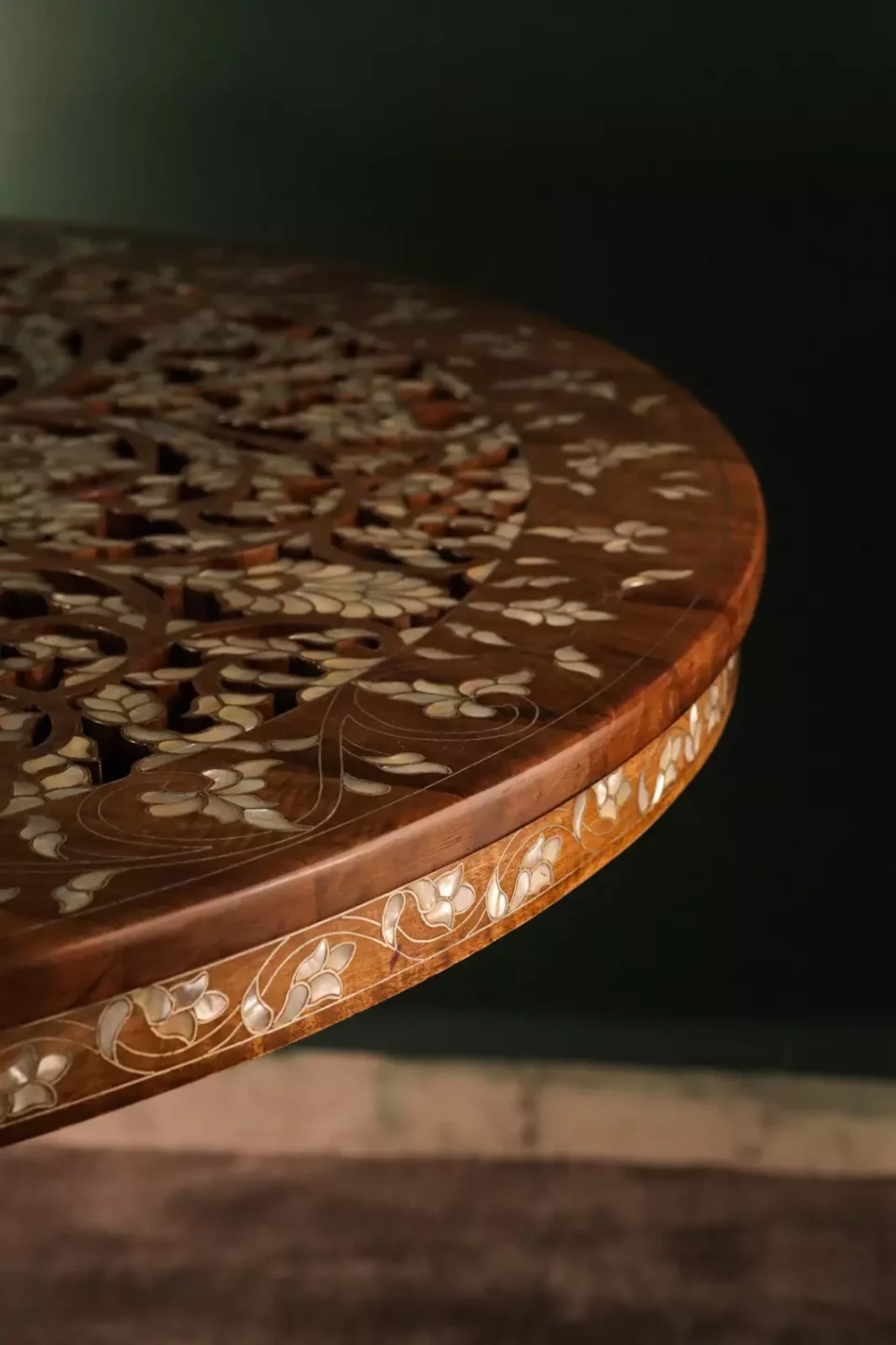 Round table carved and inlaid with mother-of-pearl