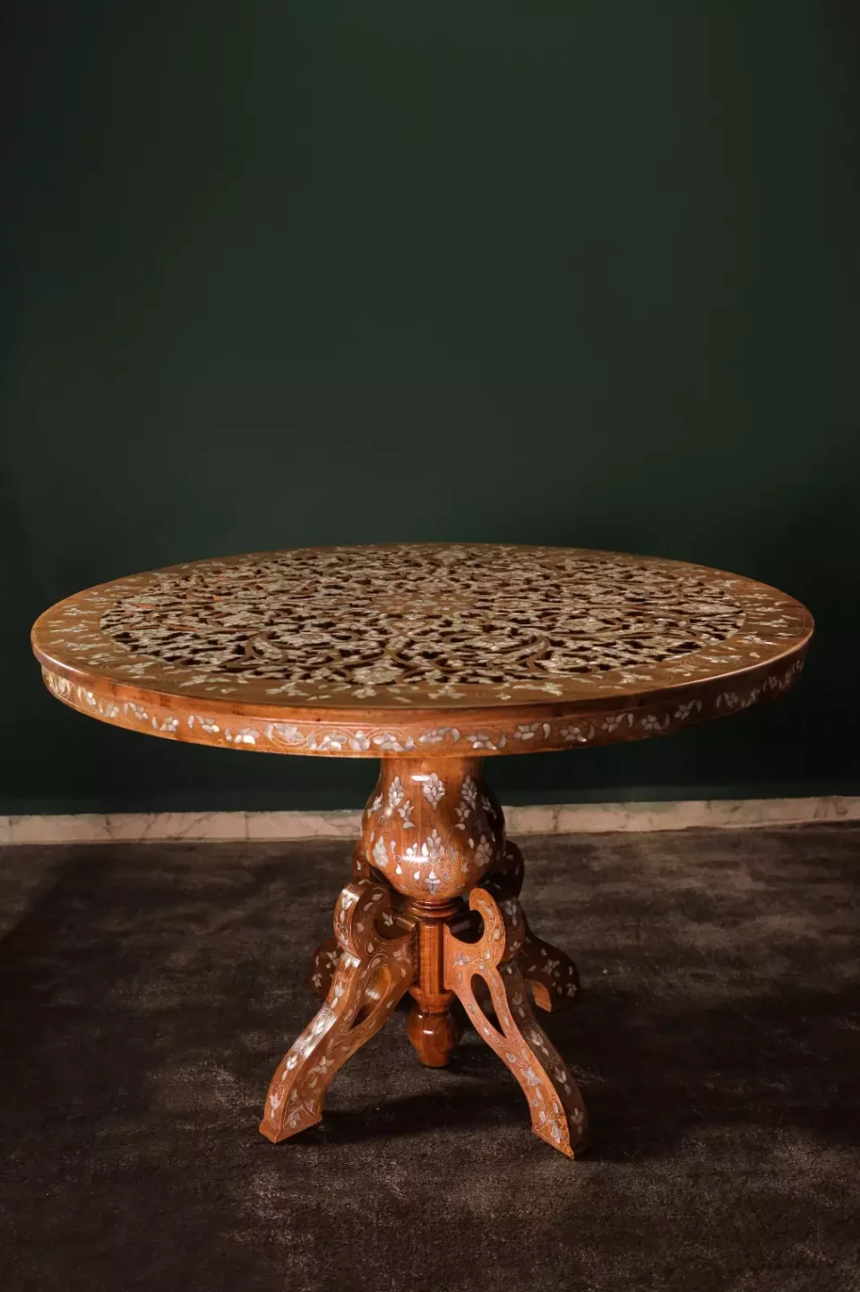 Round table carved and inlaid with mother-of-pearl