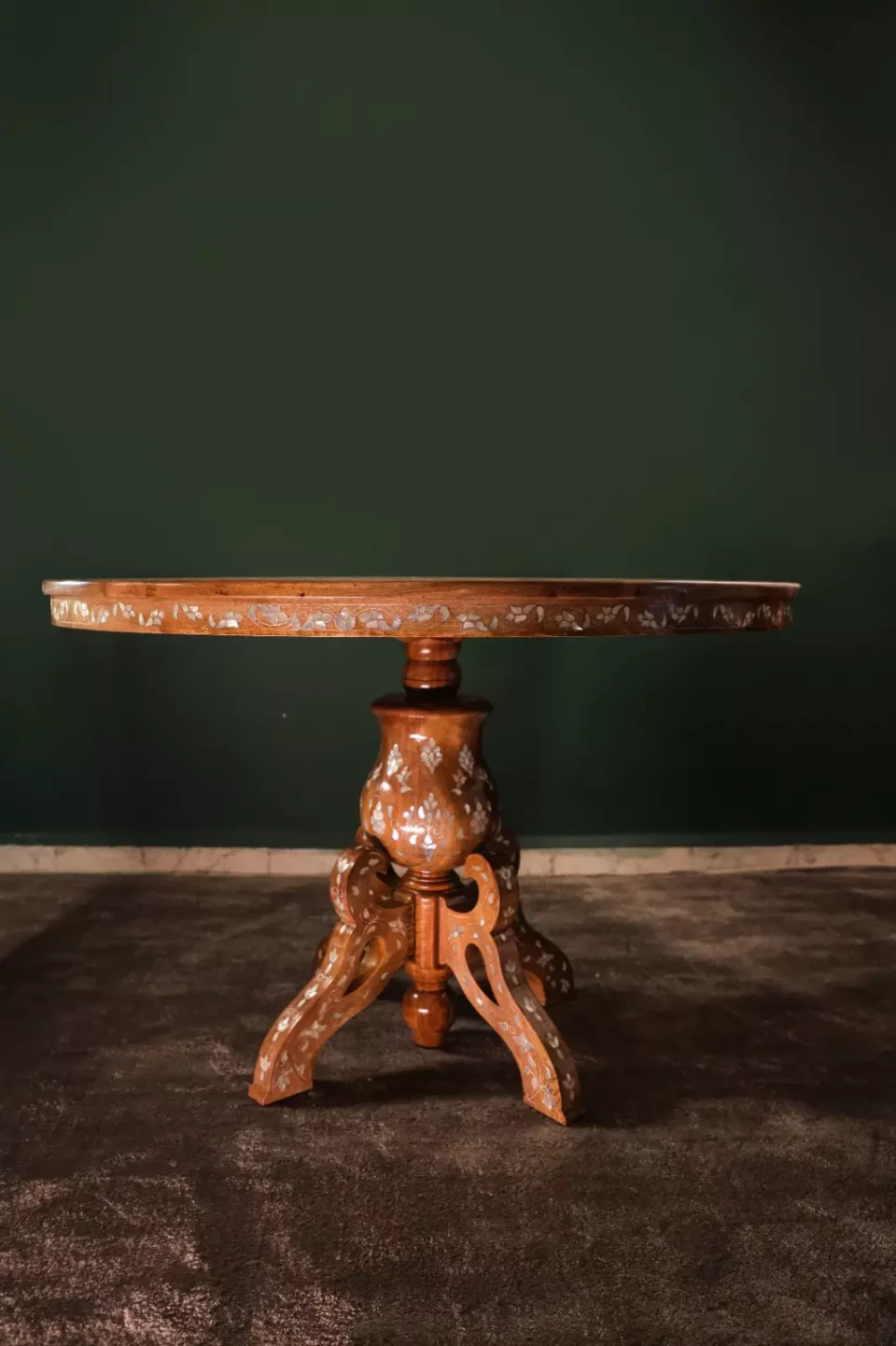 Round table carved and inlaid with mother-of-pearl