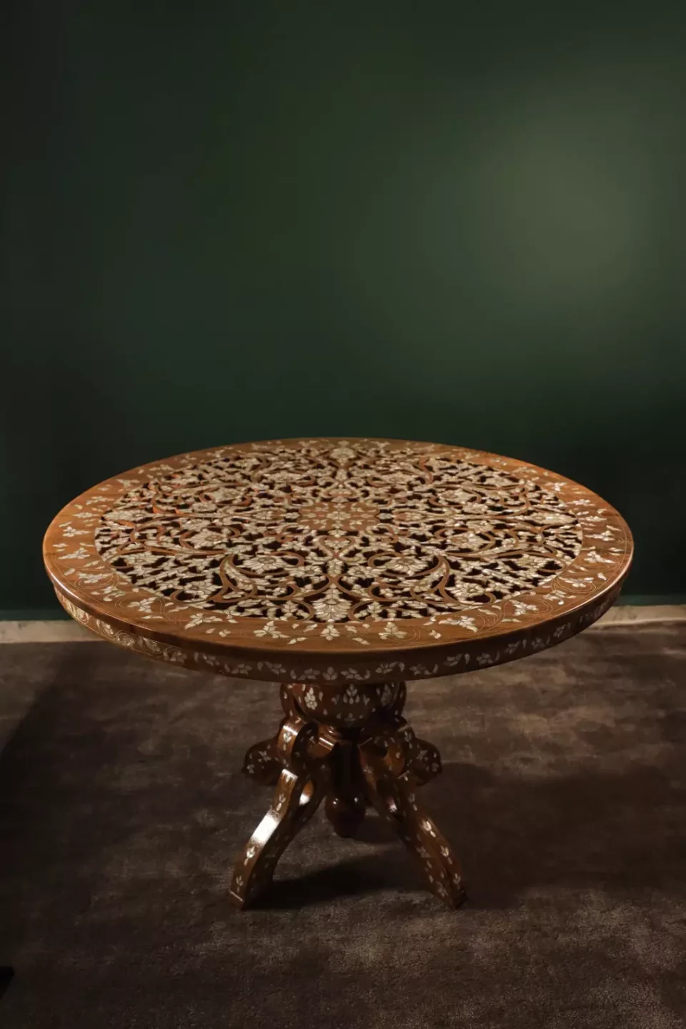 Round table carved and inlaid with mother-of-pearl
