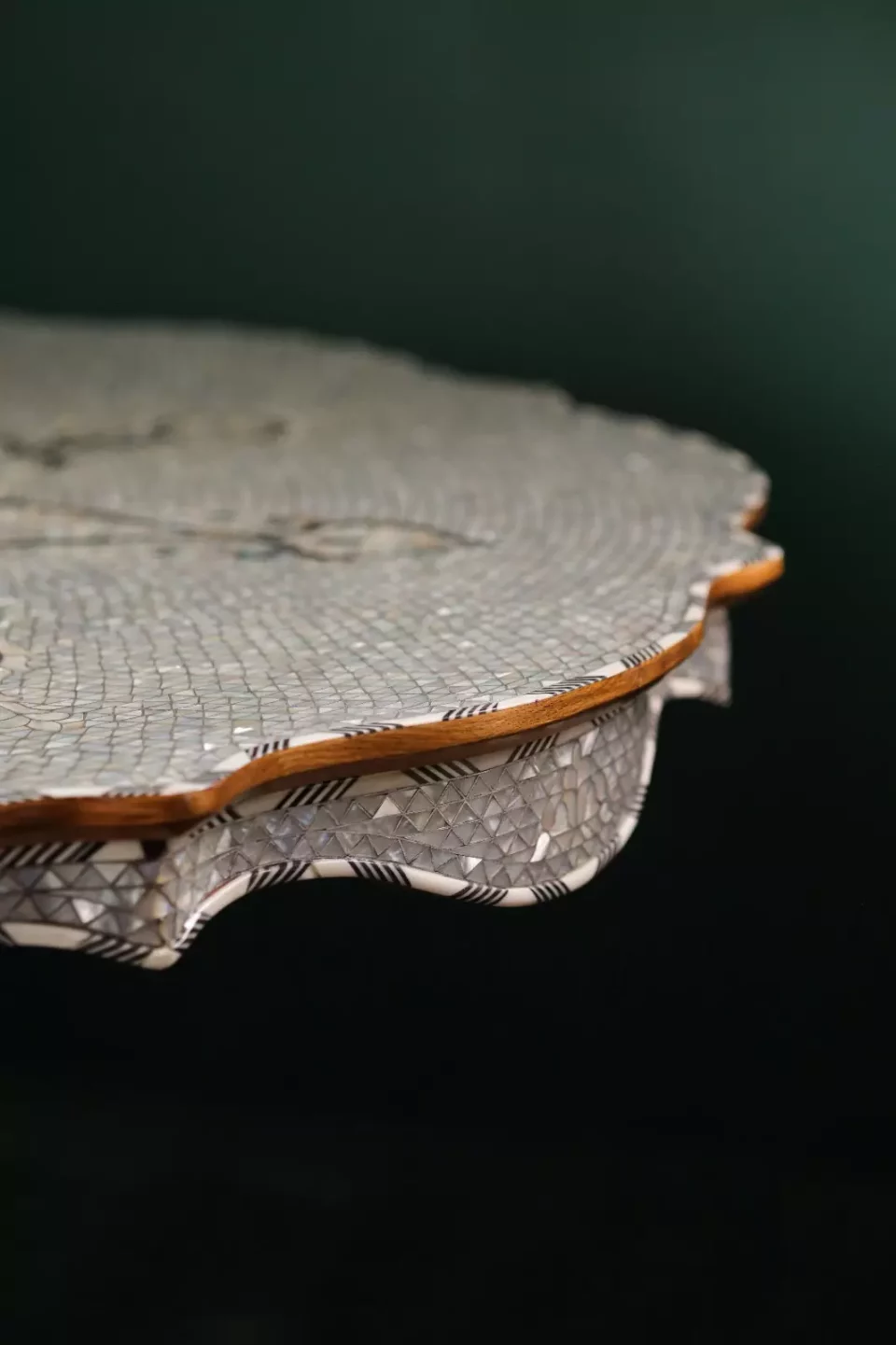 Round table completely inlaid with mother-of-pearl