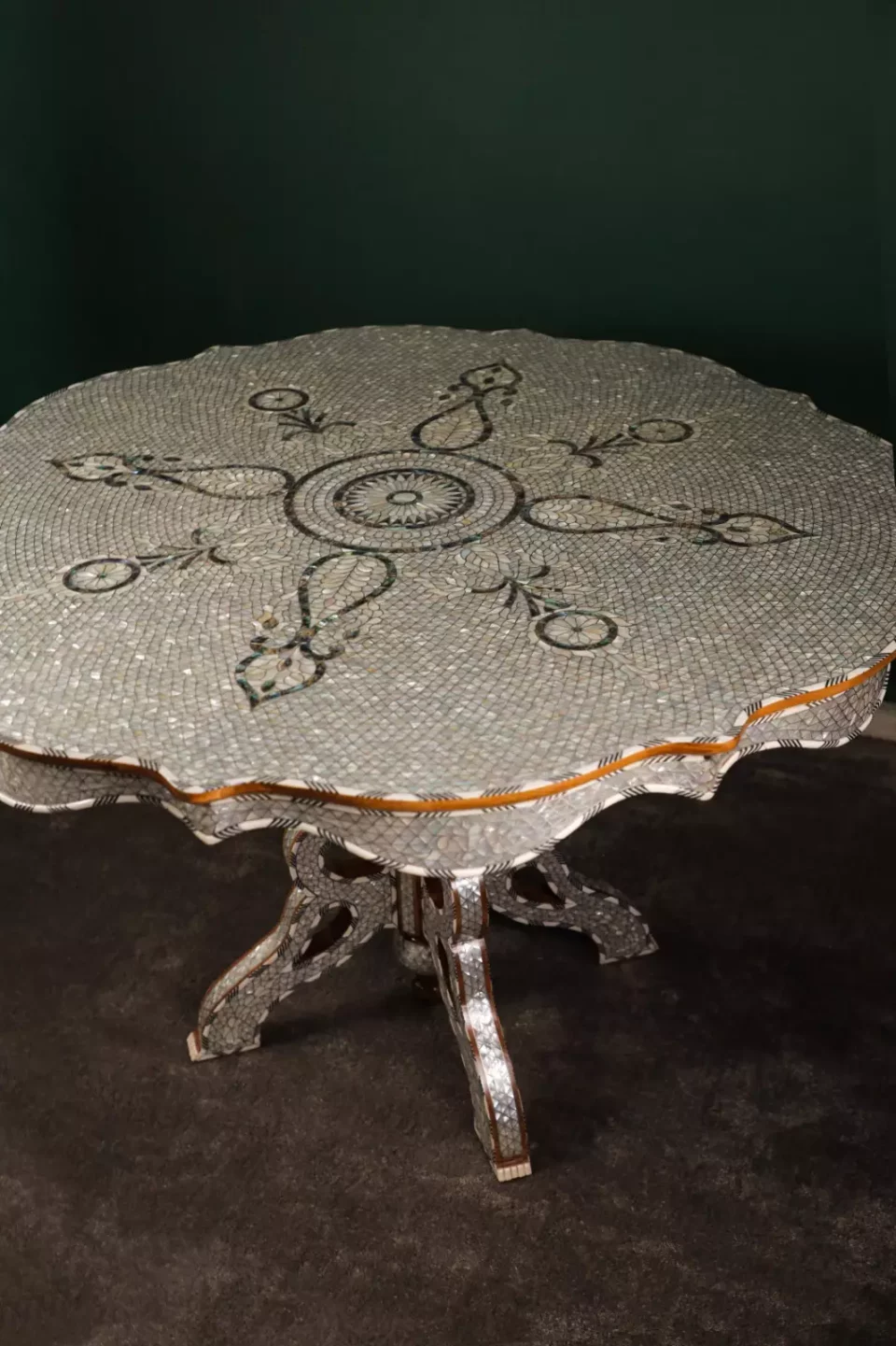 Round table completely inlaid with mother-of-pearl