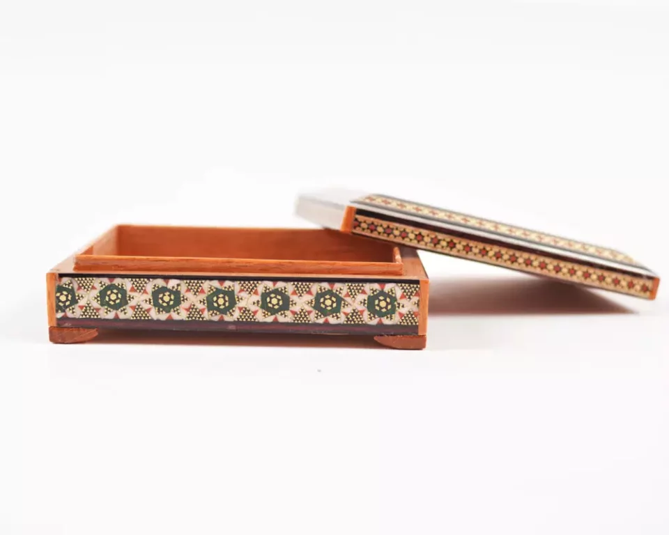 wooden box inlaid with copper with a traditional Islamic design