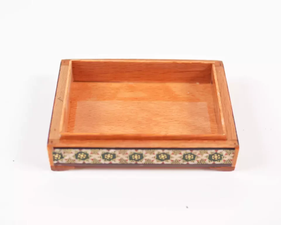 wooden box inlaid with copper with a traditional Islamic design