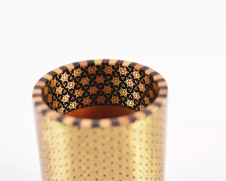 A distinctive and luxurious desk set, handcrafted from lemon wood and inlaid with copper