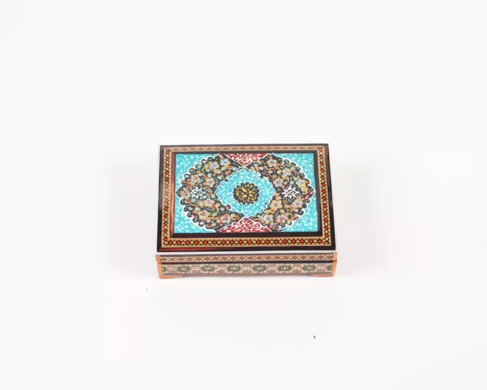 wooden box inlaid with copper with a traditional Islamic design