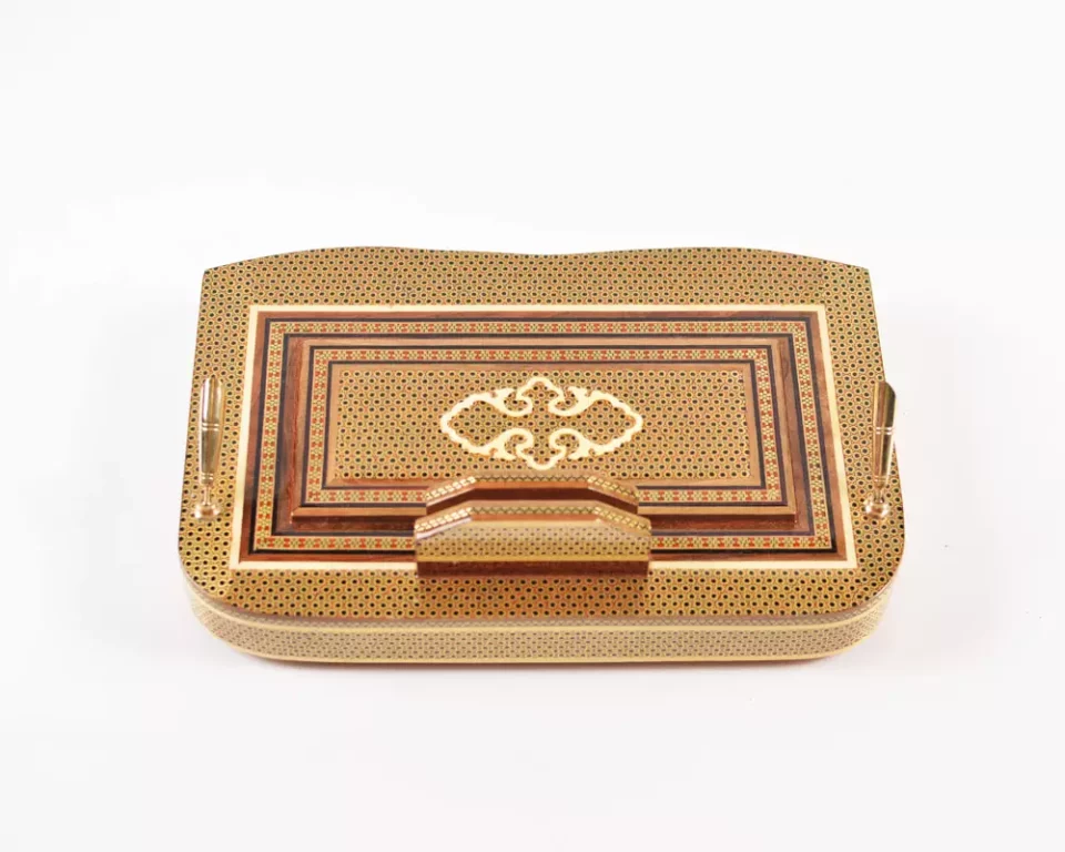 A distinctive and luxurious desk set, handcrafted from lemon wood and inlaid with copper