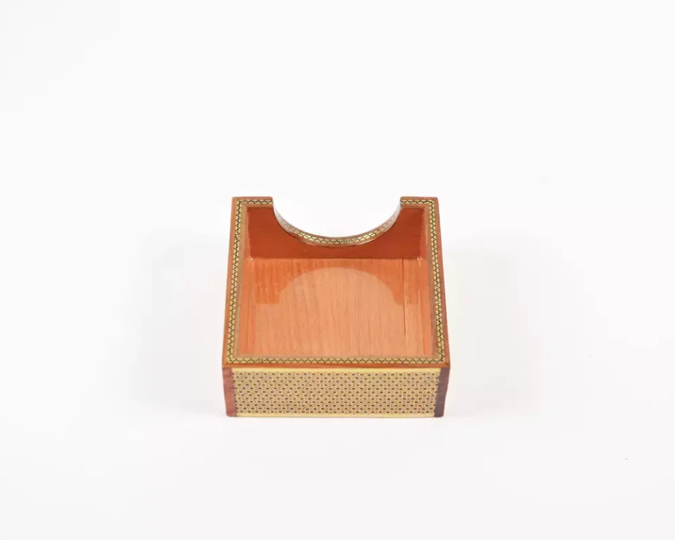 A distinctive and luxurious desk set, handcrafted from lemon wood and inlaid with copper