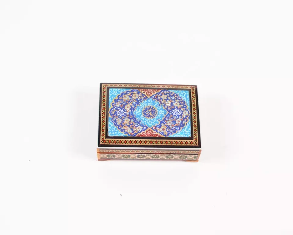 wooden box inlaid with copper with a traditional Islamic design