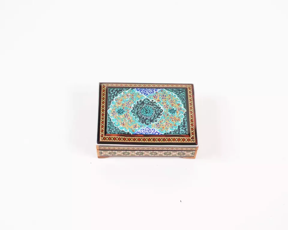 wooden box inlaid with copper with a traditional Islamic design