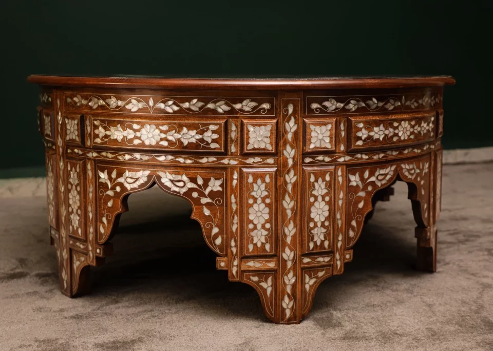 Handmade round wooden table inlaid with natural mother-of-pearl